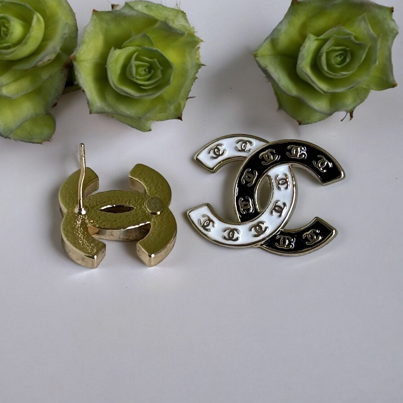 Chanel Gold Plated Double C with Black White Enamel with Mini Gold Double C’s Post EarringsLove these ! Love this season and style of Chanel ! Indulge in the epitome of luxury with these Chanel Gold Plated Double C earrings. The striking black and white e