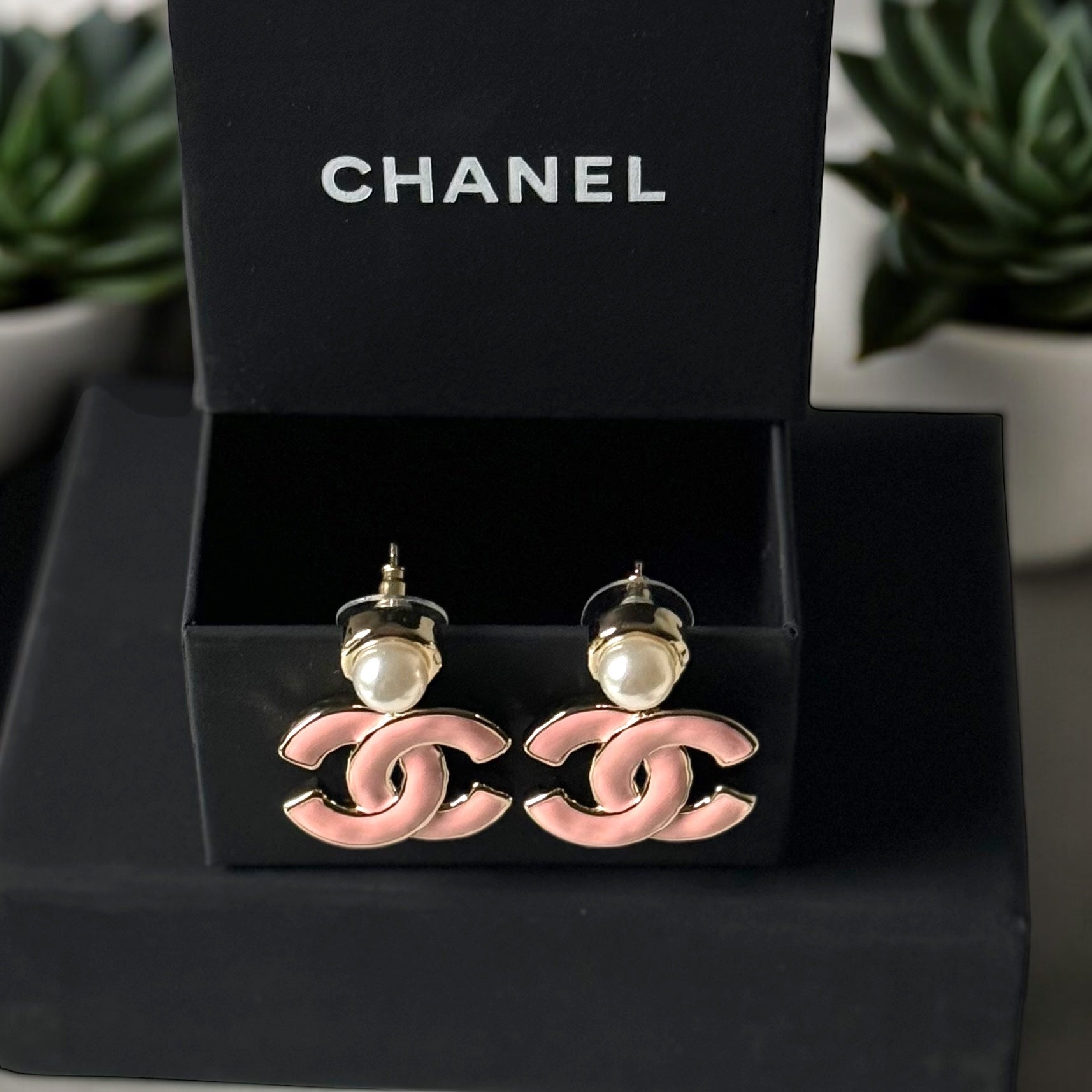 Chanel Lighter Gold Strass Pearl Post with Bigger Pink Enamel Double C Dangle EarringsAdd some playful CoCo Chanel style to your look with these gorgeous earrings! These earrings are a statement piece that will never go out of style. Made in Italy, they f