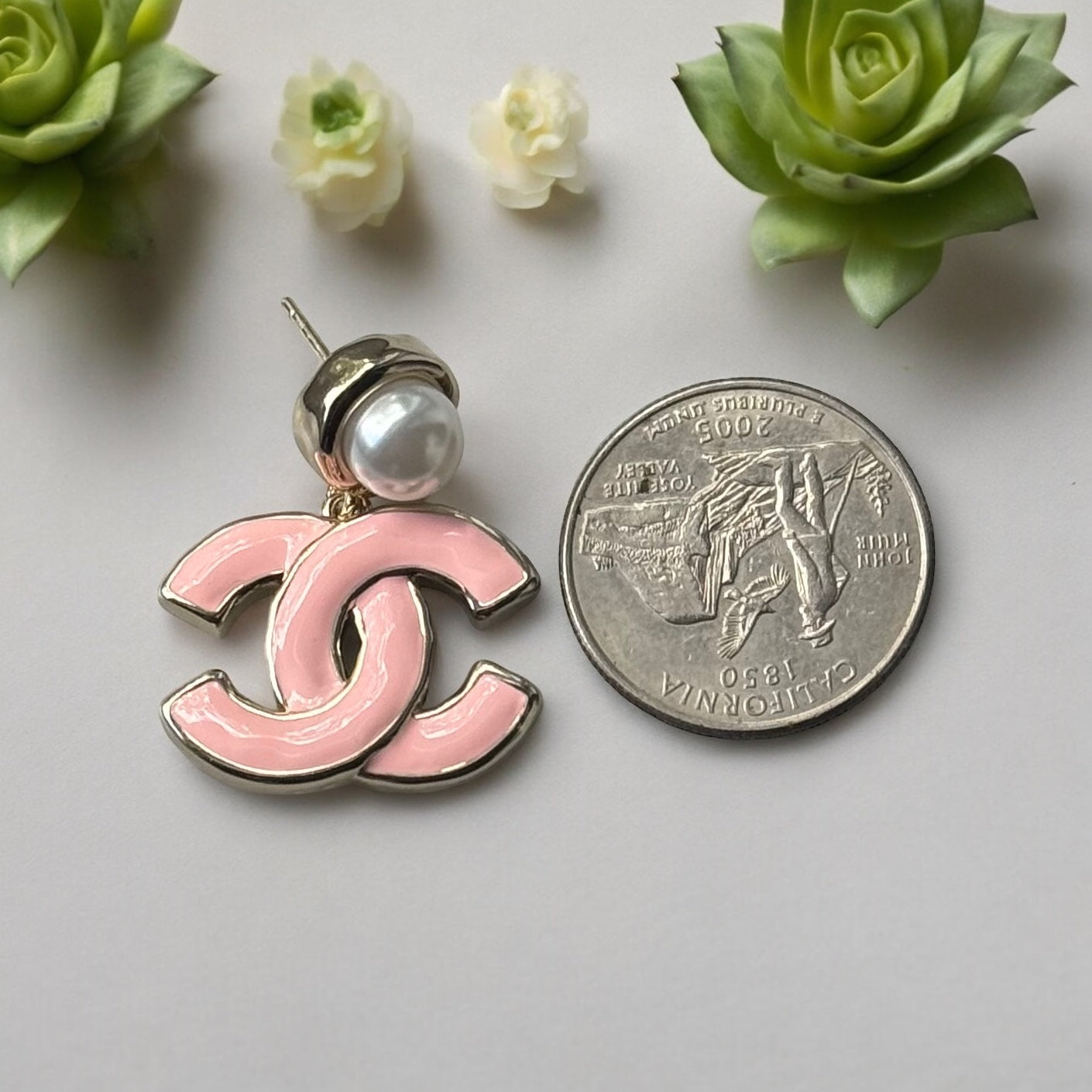 Chanel Lighter Gold Strass Pearl Post with Bigger Pink Enamel Double C Dangle EarringsAdd some playful CoCo Chanel style to your look with these gorgeous earrings! These earrings are a statement piece that will never go out of style. Made in Italy, they f