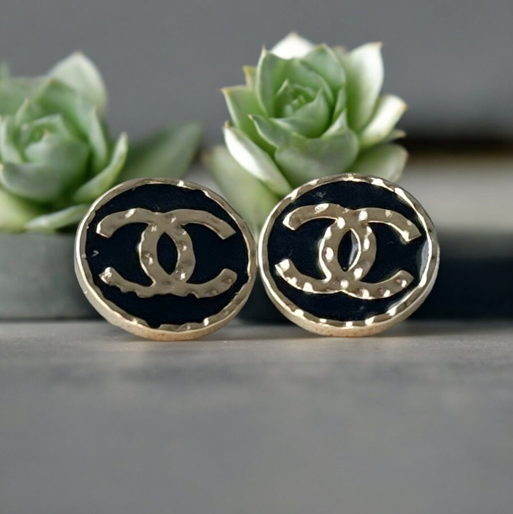 Chanel Round Gold Gold Double C Textured Black Enamel Post EarringsGorgeous ! New Never Worn Chanel Round Gold Gold Double C Textured Black Enamel Post Earrings On Consignment - The consignor said she has never worn these they were given to her as a gift