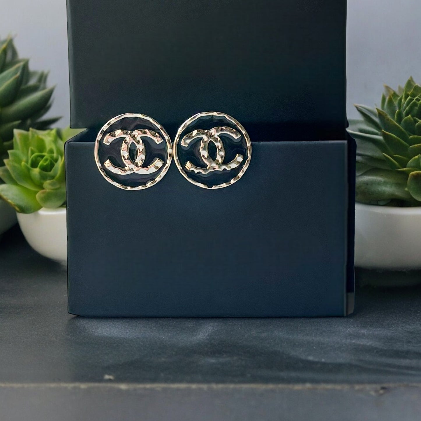 Chanel Round Gold Gold Double C Textured Black Enamel Post EarringsGorgeous ! New Never Worn Chanel Round Gold Gold Double C Textured Black Enamel Post Earrings On Consignment - The consignor said she has never worn these they were given to her as a gift