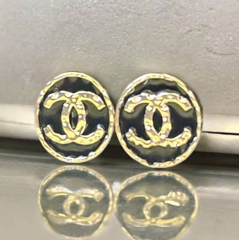 Chanel Round Gold Gold Double C Textured Black Enamel Post EarringsGorgeous ! New Never Worn Chanel Round Gold Gold Double C Textured Black Enamel Post Earrings On Consignment - The consignor said she has never worn these they were given to her as a gift