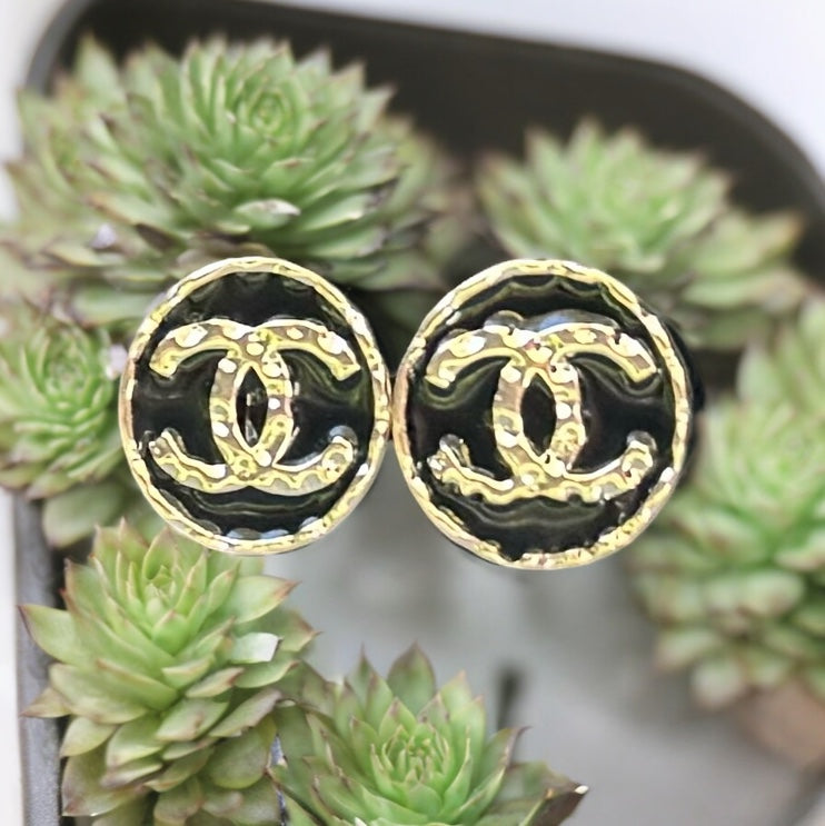 Chanel Round Gold Gold Double C Textured Black Enamel Post EarringsGorgeous ! New Never Worn Chanel Round Gold Gold Double C Textured Black Enamel Post Earrings On Consignment - The consignor said she has never worn these they were given to her as a gift