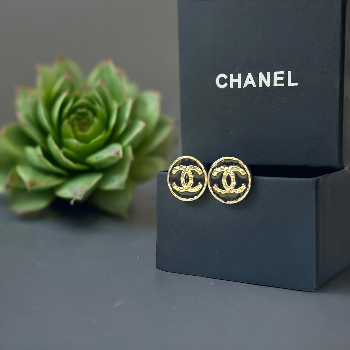 Chanel Round Gold Gold Double C Textured Black Enamel Post EarringsGorgeous ! New Never Worn Chanel Round Gold Gold Double C Textured Black Enamel Post Earrings On Consignment - The consignor said she has never worn these they were given to her as a gift