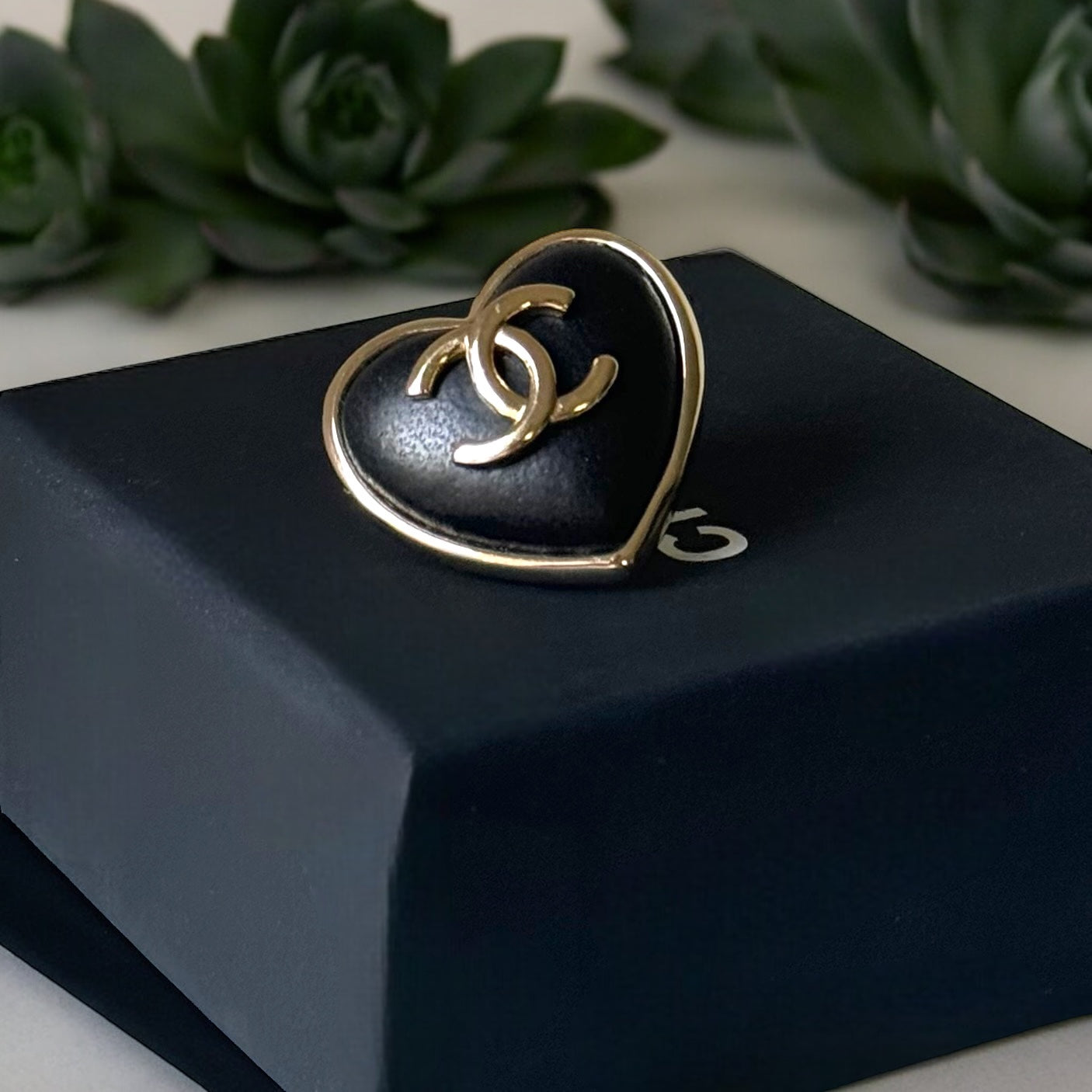 Chanel Gold Strass Heart Black Leather Double C Brooch PinChanel Gold , Strass and Black Soft Looking Heart Shaped Pin Perfect minimalistic size - Little bigger than a U.S. quarter coin . Clearly stamped on the back S22 22A Made in France On consignment L