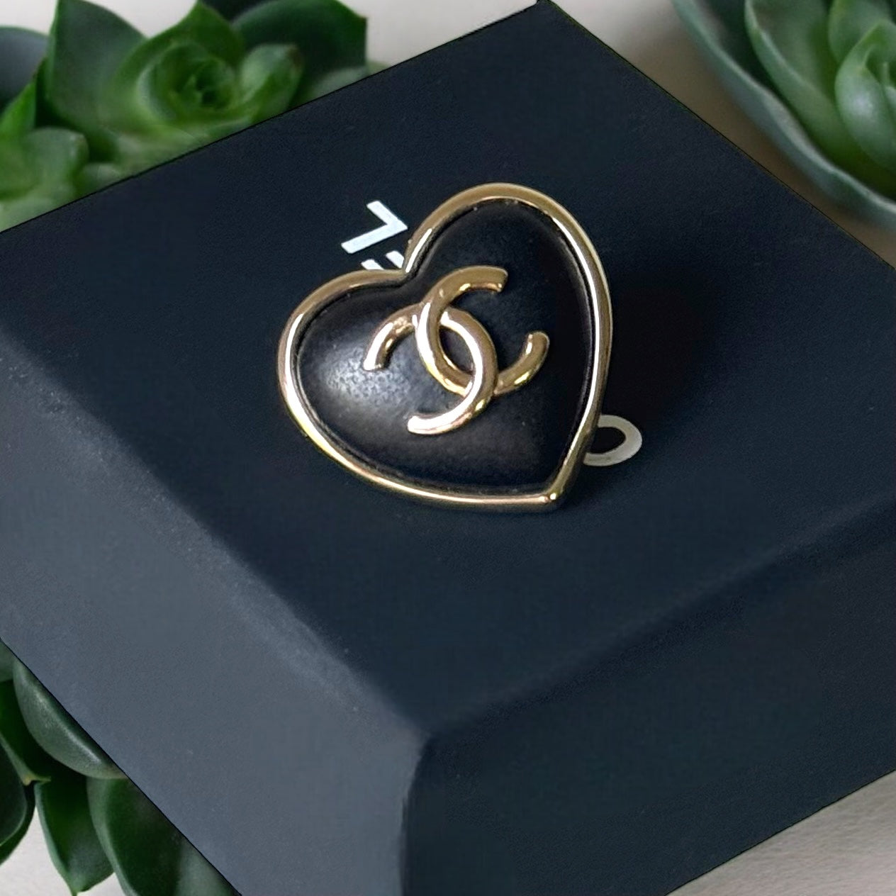 Chanel Gold Strass Heart Black Leather Double C Brooch PinChanel Gold , Strass and Black Soft Looking Heart Shaped Pin Perfect minimalistic size - Little bigger than a U.S. quarter coin . Clearly stamped on the back S22 22A Made in France On consignment L