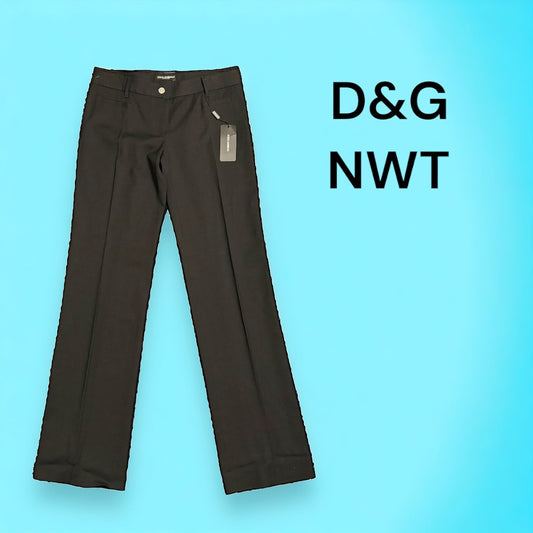 Dolce & Gabbana New Vintage Women’s Black Straight Leg PantsUpgrade your work wardrobe with these designer vintage Dolce & Gabbana black straight leg pants. Made with Y2K style in mind, these career slacks are new with tags and retired out of stock. Don't