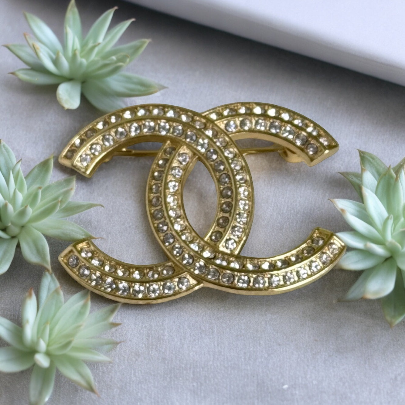 Chanel Gold Double C double layer of clear crystals Brooch PinClassic Timeless In nice pre-owned condition Comes with the Chanel Gift Box & Bag Brighter GoldBright Gold,Brooch Pin,Chanel,Chanel Brooch,Chanel Double C,Chanel Mark,Classic Chanel,Clear Cryst