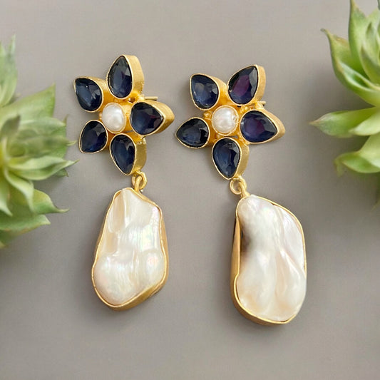 Baroque Pearls & Blue Crystals Artisan Made Drop Post Earrings"Add a touch of whimsy to any outfit with our Baroque Pearls & Blue Crystals Earrings. Hand crafted with gold hollow wiring and designed by me, these earrings are perfect for resort wear or boh