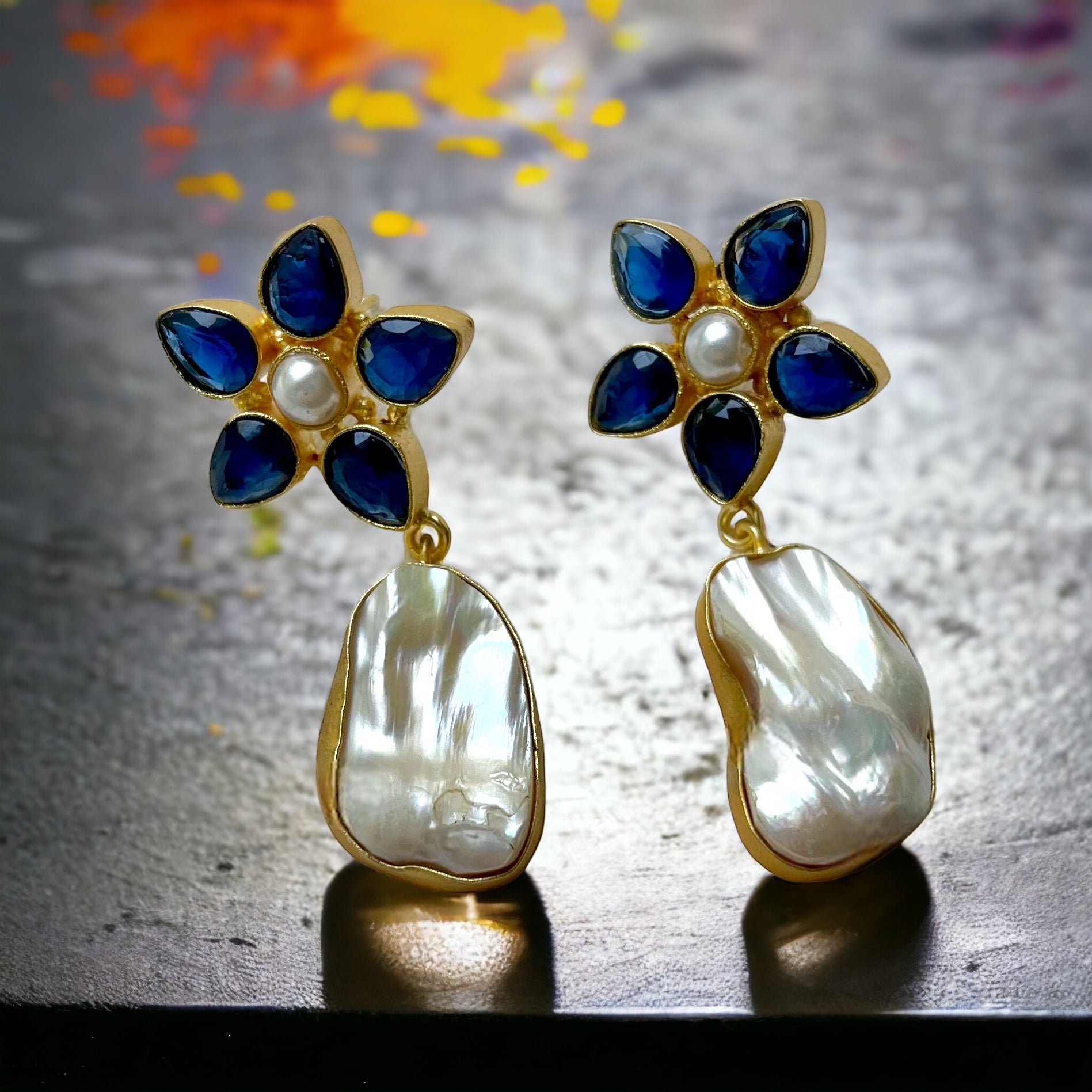 Baroque Pearls & Blue Crystals Artisan Made Drop Post Earrings"Add a touch of whimsy to any outfit with our Baroque Pearls & Blue Crystals Earrings. Hand crafted with gold hollow wiring and designed by me, these earrings are perfect for resort wear or boh