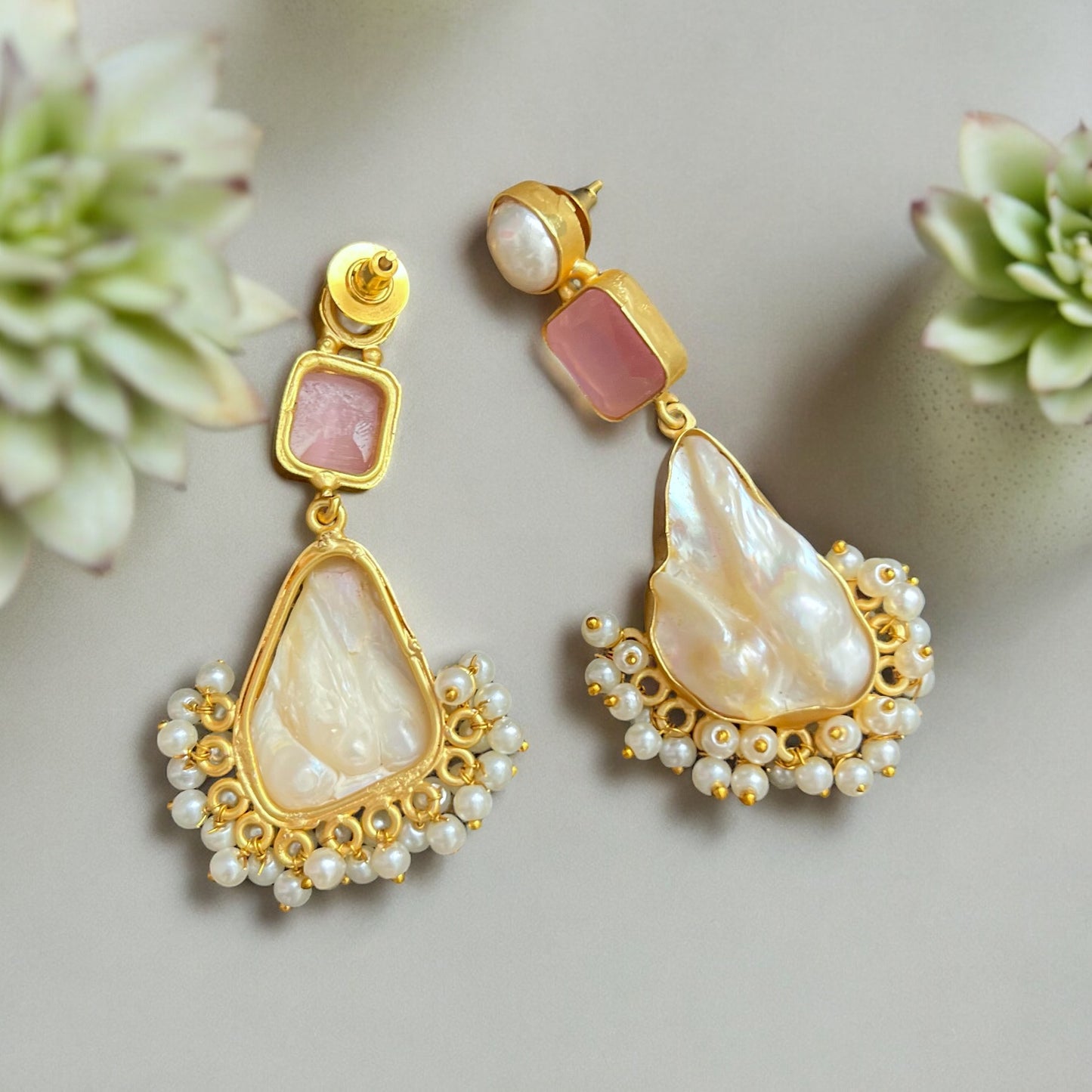 Artisan Made Gold Wire Baroque Pearls With Pink Crystal Post Dangle EarringsStep up your earring game with these Artisan Made Gold Wire Baroque Pearls With Pink Crystal Post Dangle Earrings! Real baroque pearls and hollow gold plated wire make these boho