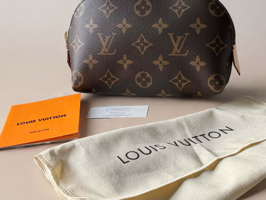 Louis Vuitton Monogrammed Pouch Never UsedOwn this Louis Vuitton Monogrammed Pouch and add a touch of classic style to your wardrobe. Never used and on consignment, it comes with a dust bag for protection. Perfect size for on-the-go adventures. Take a ris