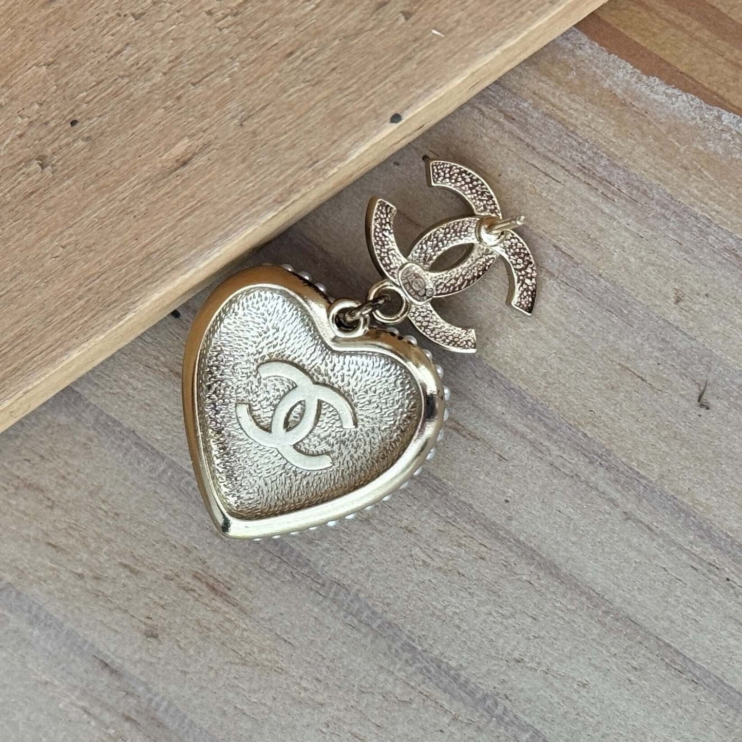 Pre-Owned Authentic Chanel CC Heart Dangle Earrings