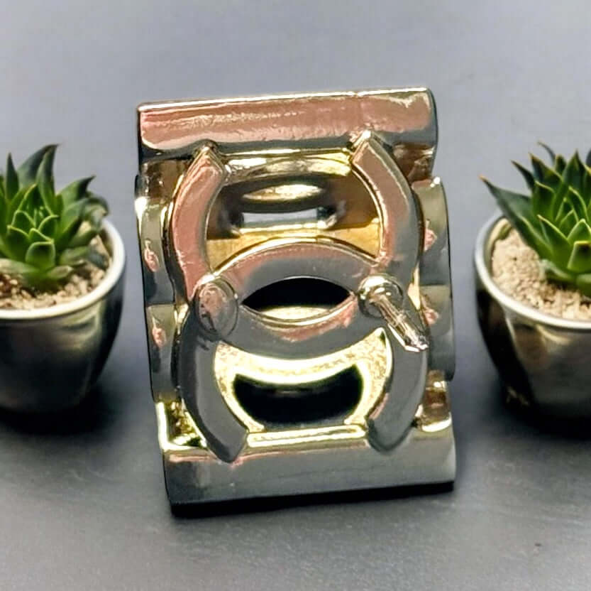 Chanel Lighter Gold Double C with Crystals Triangle Styled Smaller Brooch PinSet your style on fire with the Chanel Lighter Gold Double C brooch pin. Covered in dazzling crystals, this triangular piece adds a touch of bling to any outfit. Playfully chic,