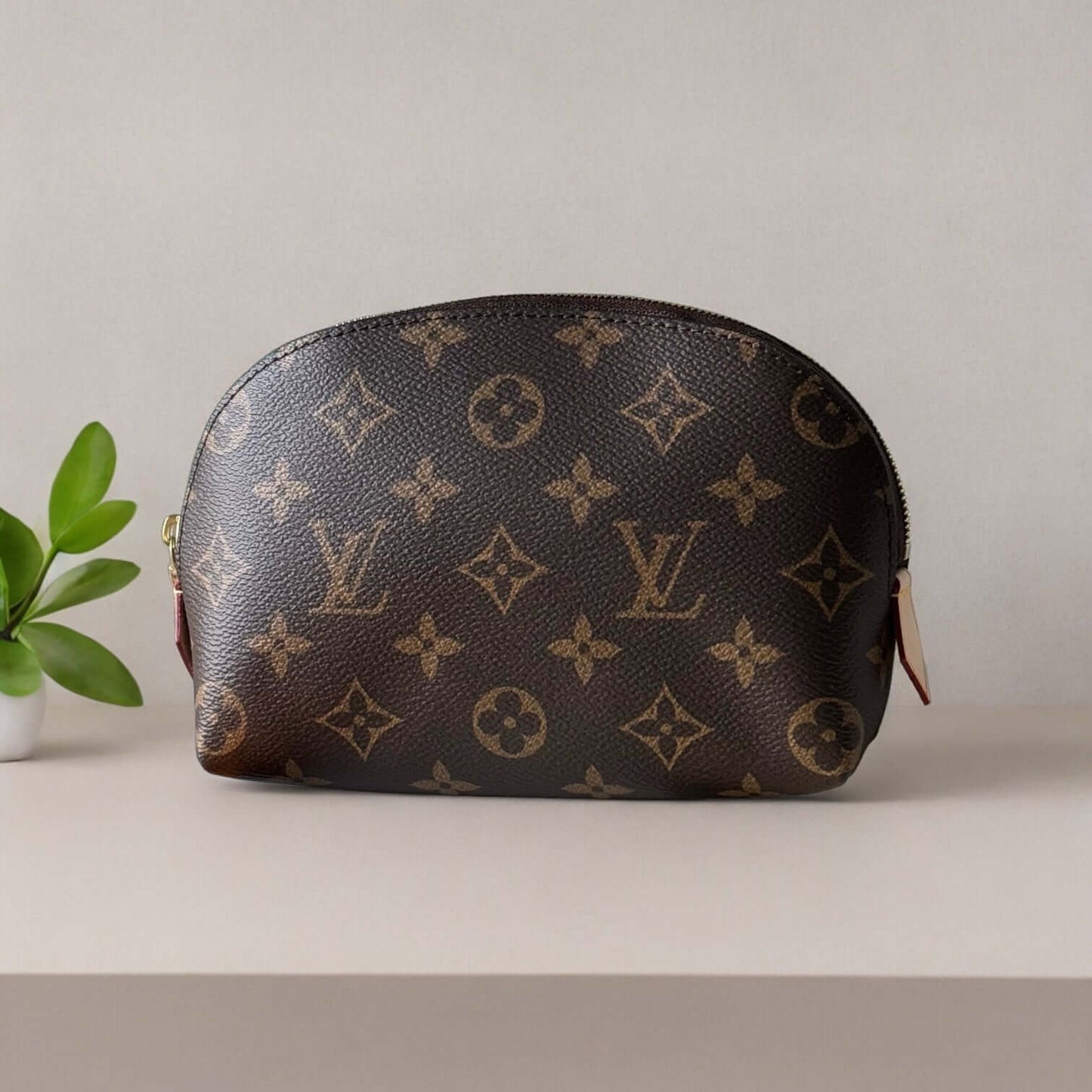 Louis Vuitton Monogrammed Pouch Never UsedOwn this Louis Vuitton Monogrammed Pouch and add a touch of classic style to your wardrobe. Never used and on consignment, it comes with a dust bag for protection. Perfect size for on-the-go adventures. Take a ris My Mama Found What 