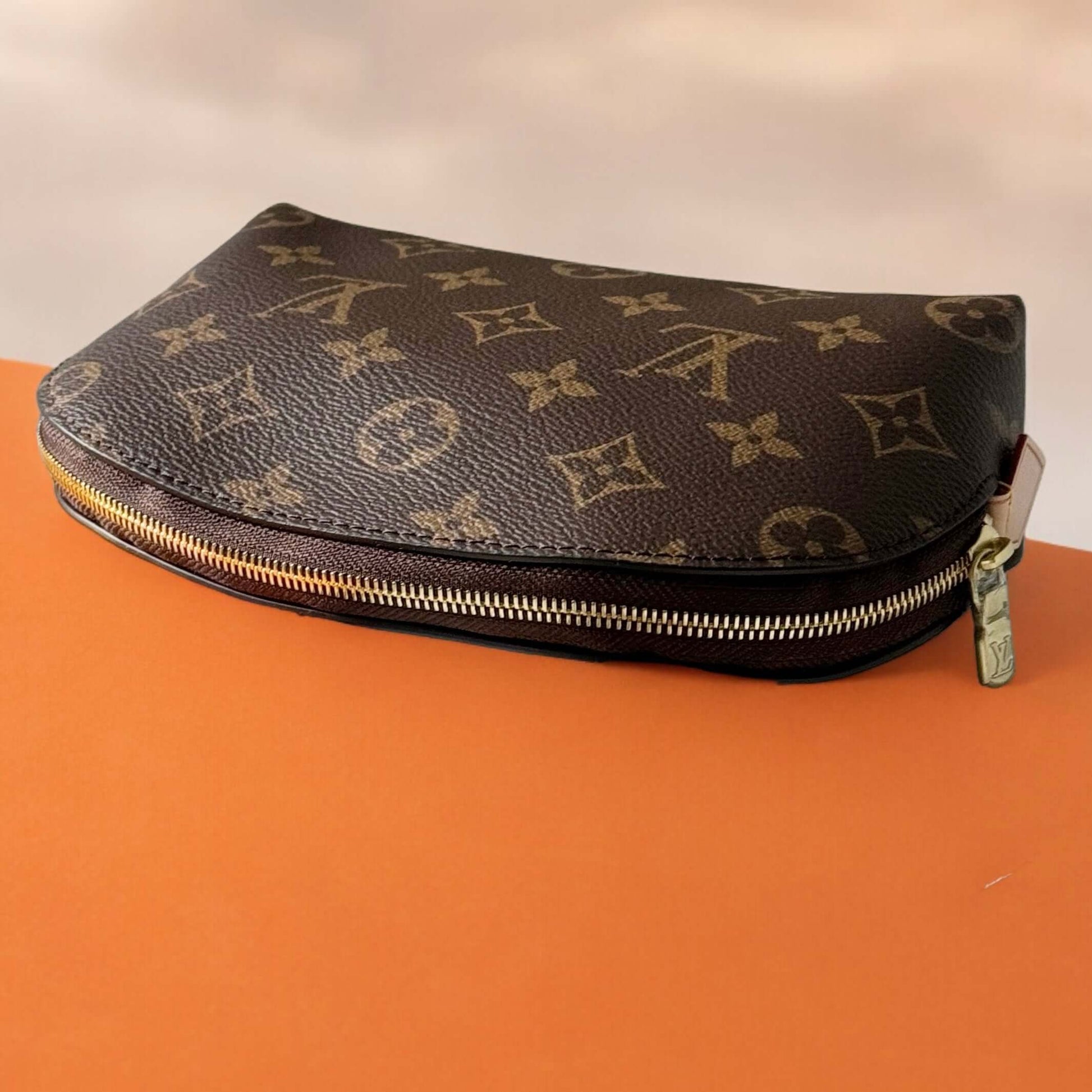 Louis Vuitton Monogrammed Pouch Never UsedOwn this Louis Vuitton Monogrammed Pouch and add a touch of classic style to your wardrobe. Never used and on consignment, it comes with a dust bag for protection. Perfect size for on-the-go adventures. Take a ris