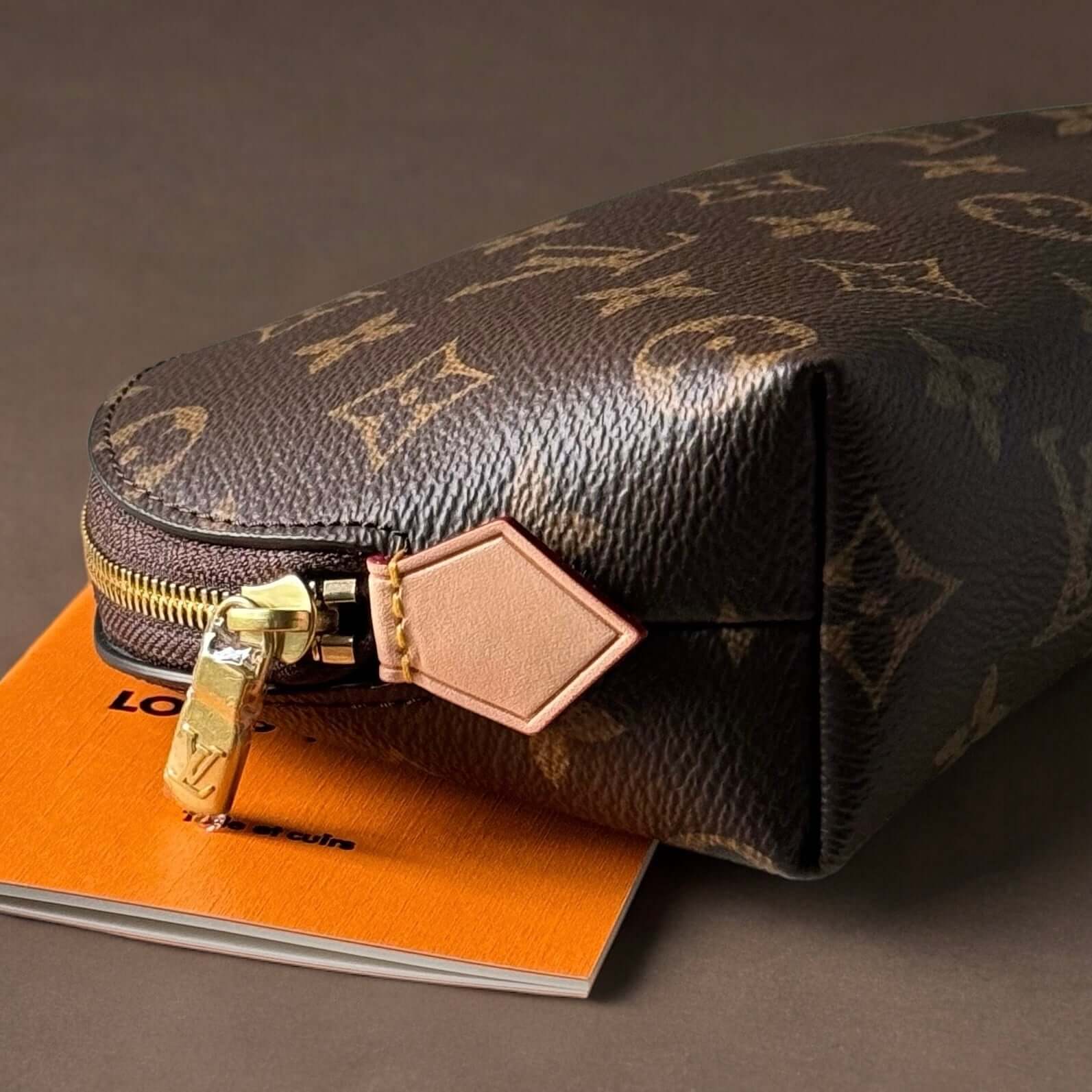 Louis Vuitton Monogrammed Pouch Never UsedOwn this Louis Vuitton Monogrammed Pouch and add a touch of classic style to your wardrobe. Never used and on consignment, it comes with a dust bag for protection. Perfect size for on-the-go adventures. Take a ris