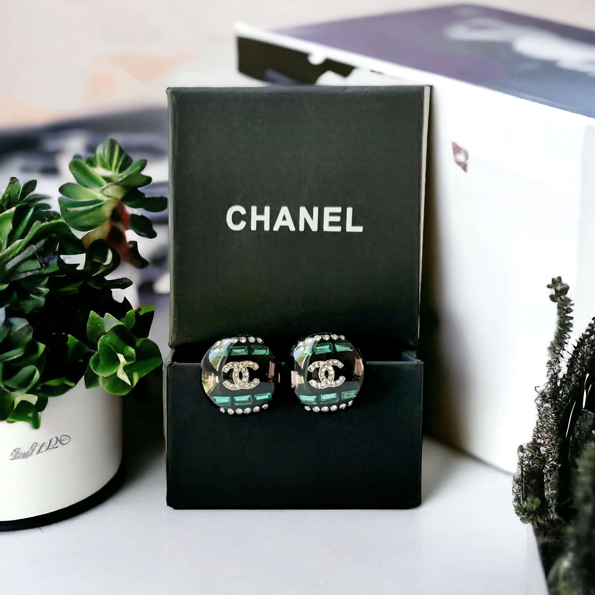Chanel Colorful Lucite Crystal Double C RAREBe the ultimate rockstar with these Chanel Colorful Lucite Crystal Double C earrings. The rare design features a crystal-encrusted double C center, surrounded by colorful accents. A must-have for any fashion lov