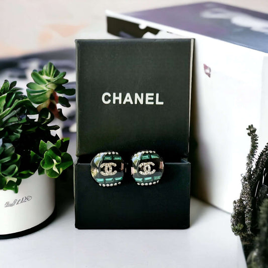 Chanel Colorful Lucite Crystal Double C RAREBe the ultimate rockstar with these Chanel Colorful Lucite Crystal Double C earrings. The rare design features a crystal-encrusted double C center, surrounded by colorful accents. A must-have for any fashion lov My Mama Found What 