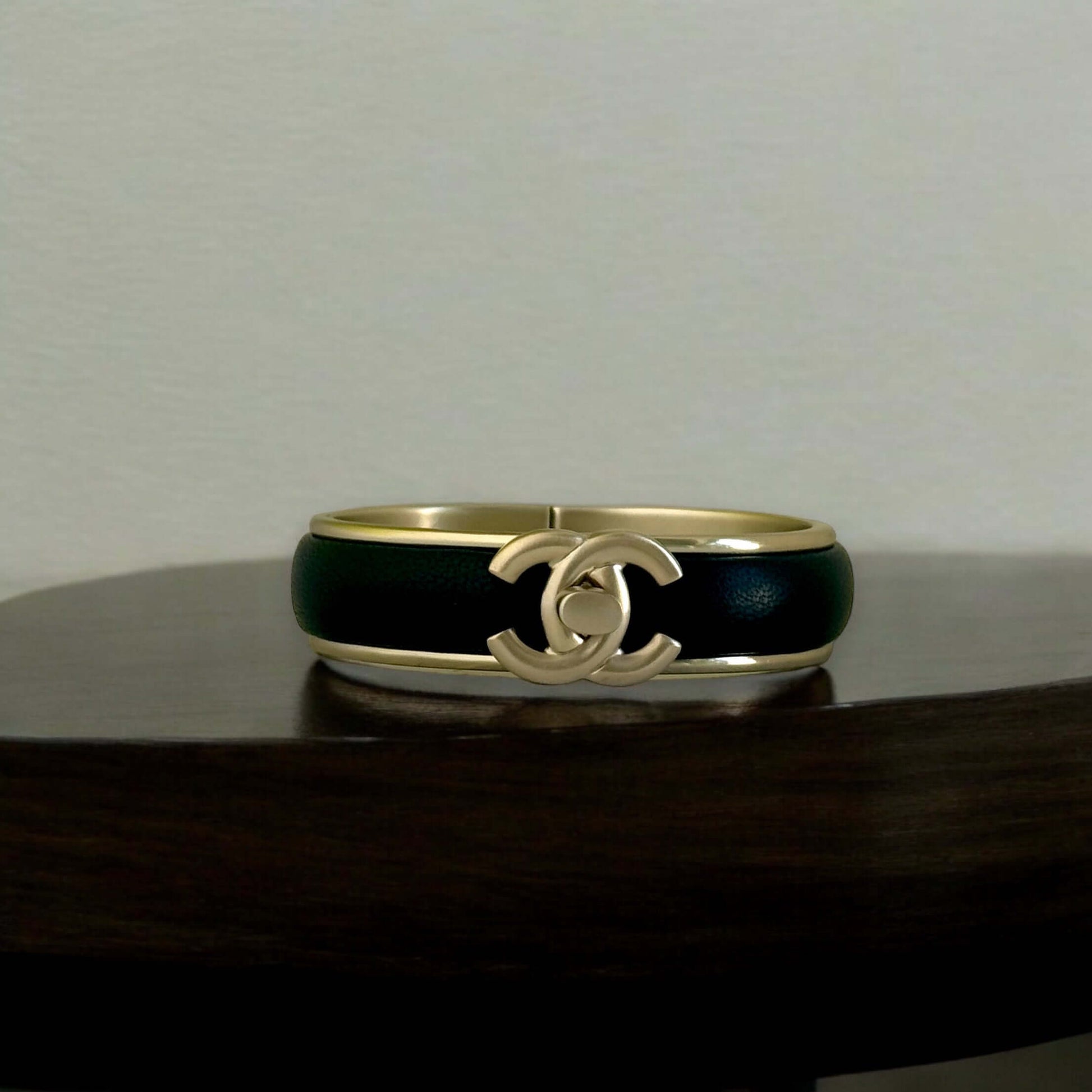 Pre-Owned Chanel Gold Blk Leather CC Lock Cuff - My Mama Found What  