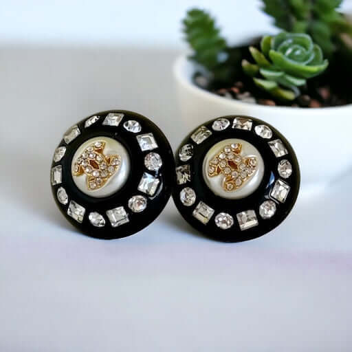 Chanel Gold Double C’s with crystals & Black Lucite Post EarringsPut a shine on your style with these Chanel Gold CC's earrings! bling eye-catching, these round earrings feature black lucite and a gold crystal centerEarringsMy Mama Found What