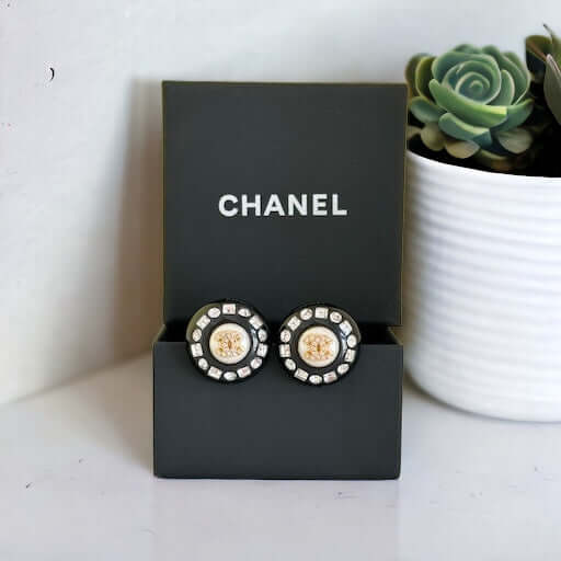 Chanel Gold Double C’s with crystals & Black Lucite Post EarringsPut a shine on your style with these Chanel Gold CC's earrings! bling eye-catching, these round earrings feature black lucite and a gold crystal centerEarringsMy Mama Found What My Mama Found What 