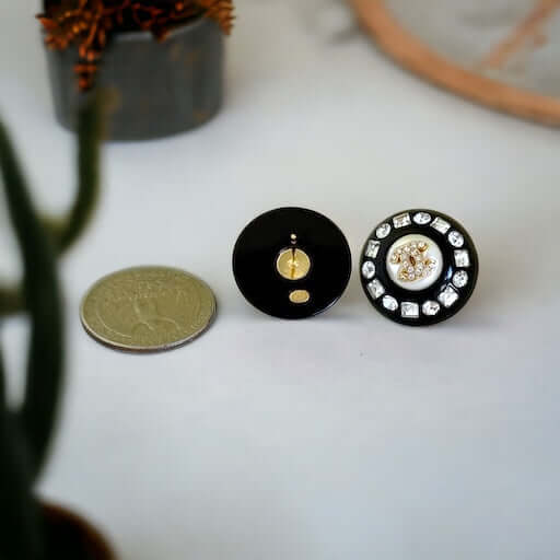 Chanel Gold Double C’s with crystals & Black Lucite Post EarringsPut a shine on your style with these Chanel Gold CC's earrings! bling eye-catching, these round earrings feature black lucite and a gold crystal centerEarringsMy Mama Found What